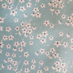 Toile enduite Petites fleurs japonaises blanches sur fond turquoise 0,00 €
