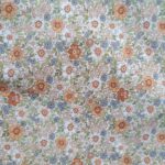 Petites fleurs saumon et bleu grisé sur fond beige