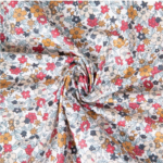 Fleurs bleues ocres et rouges sur fond blanc